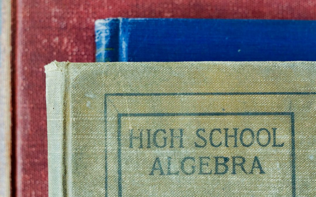 a close-up of an old high school algebra textbook